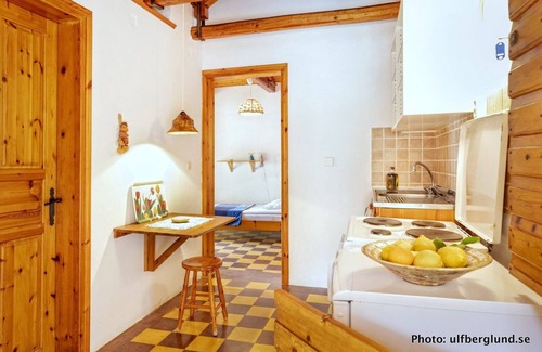 Vasilikos Cottage | Self catered cottage with large veranda and garden with hammock near the beach.