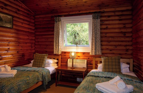Duirinish Cabin | Self-Catering log cabin near Plockton and the Isle of Skye secluded, well equipped and dog friendly.