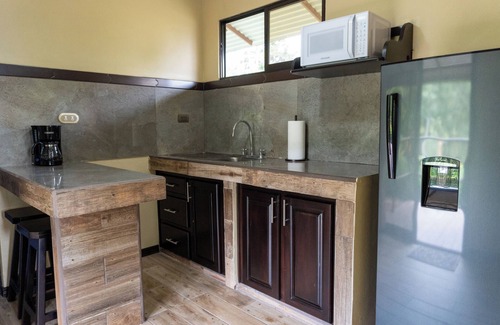 Rio Cuarto de Grecia Cabin | Selva Negra Loft: surrounded by mountains, rivers, lakes, and lush wildlife.