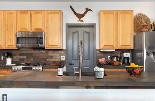 Hartman Vistas House | Serene desert escape with stunning mountain views, and private heated pool/spa.