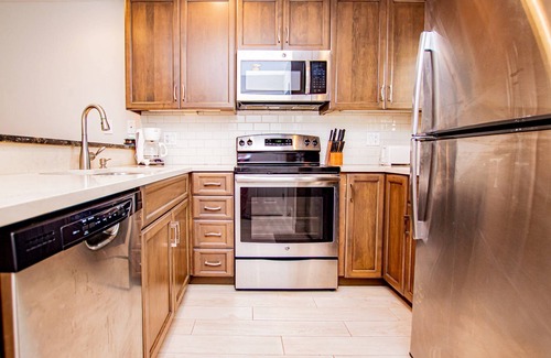 Wesley Chapel Condo | Serene Hideaway – Ground-Floor Corner Condo w/King Suite, Smart TVs & Private Patio!