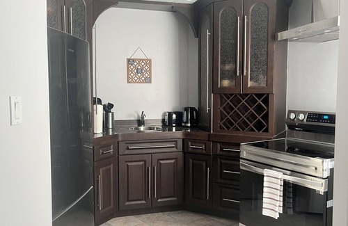 Timmins House | Serene & Luxurious basement apartment.