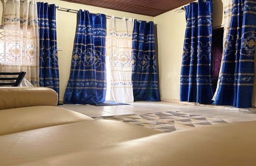 Kololi Apartment | Serene Room and Living Room