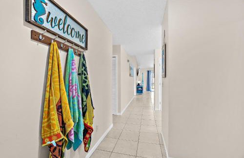 Indialantic House | Serene Seaside Retreat - Dog friendly - 2BR Townhouse with Shared Heated Pool Steps to Paradise Beach!
