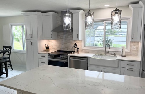 Fort Myers Shores House | Serene Vacation Home on Water with Luxurious Pool.