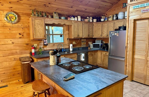 Mentone Cabin | Serenity-A Romantic Secluded Riverfront 1 level expansive log cabin with hot-tub