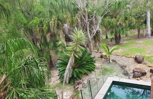 Agnes Water Apartment | Serenity a Tropical oasis set on 4 acres of land with pool.