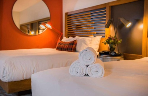 Live Oak Hotel | Serenity Now: Your Santa Cruz Retreat with Deck, Pool & Fireside Relaxation