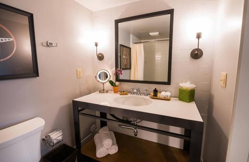 Live Oak Hotel | Serenity Now: Your Santa Cruz Retreat with Deck, Pool & Fireside Relaxation