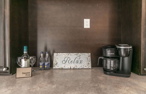 Barrie House | Serenity & Style: 4BR w/Hot Tub, BBQ & Fire Table