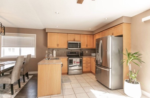 Barrie House | Serenity & Style: 4BR w/Hot Tub, BBQ & Fire Table