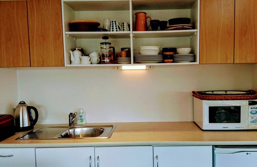 Surfdale Apartment | Shelly Beach Studio sea views over Putiki Bay