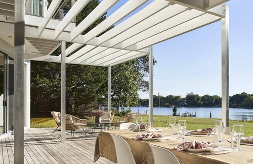 Menantic Creek House | Shelter Island Sun Filled Modern Waterfront Home with Dock