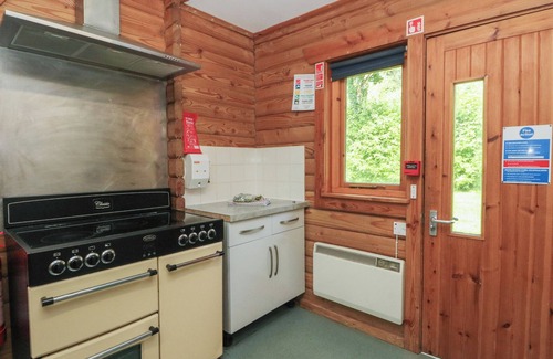 Brodick Cottage | SHORE LODGE BRODICK CASTLE, pet friendly, with open fire in Brodick