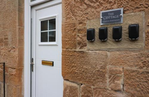 Airdrie Apartment | Signature - Linden Cottage Room 3