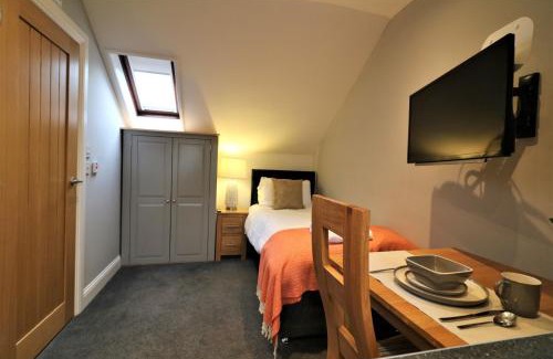 Airdrie Apartment | Signature - Linden Cottage Room 4
