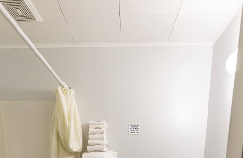 Creston House | Simple room with 2 queen beds, full bathroom.