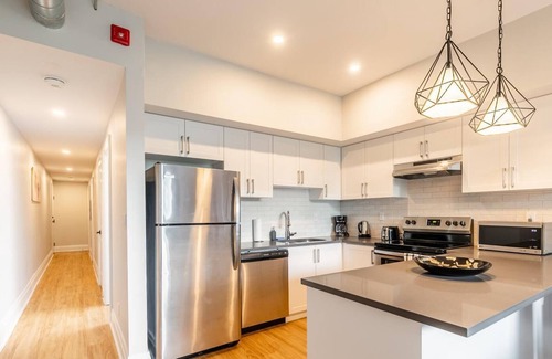 Beasley Apartment | Simply Comfort. Grand 2BR Loft Garden View