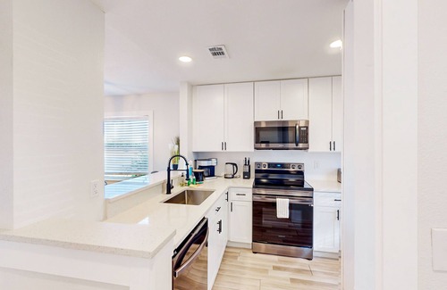 Bay Acres Condo | Single-story duplex near beach with renovated interior, AC-Dogs ok