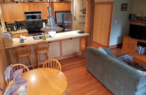 Tofino Condo | Sit and relax in the sun in your yard, or walk 2 minutes to Chesterman beach