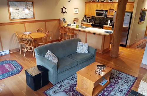 Tofino Condo | Sit and relax in the sun in your yard, or walk 2 minutes to Chesterman beach