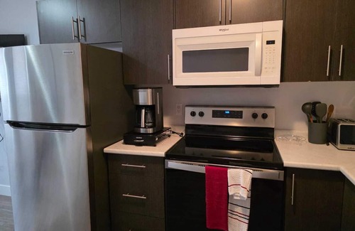 Saskatoon Apartment | Sit back and relax in this calm, stylish space at Springfield Kensington!
