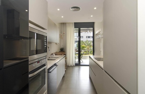 Vallpineda Apartment | Sitges Spaces Garden Paradise -3 B.R./3 Bath/Huge Garden-Terrace & Pool-Sleeps 8