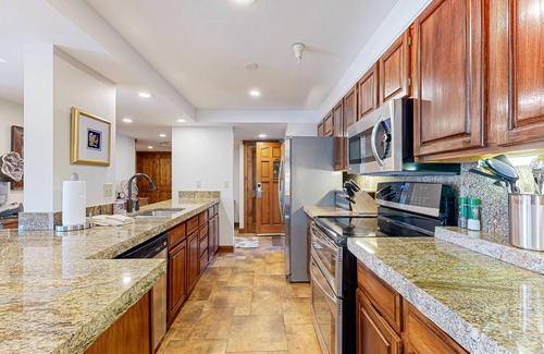 Steamboat Springs Condo | ski-in/out condo with fireplace, washer/dryer, pool, & hot tubs