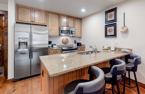 Four O'Clock Condo | Ski-in/out condo right near downtown with hot tub, pool & balcony