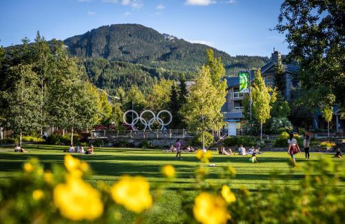Upper Village House | Ski In Ski Out Apartment w Pool and Hot Tub by Harmony Whistler