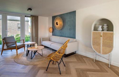 Sint Maarten House | Slapen tussen de duinen by Droomvilla
