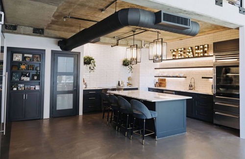 Uptown Condo | Sleek and Spacious Executive Loft with Full Bar, Theater Room, Fitness Room