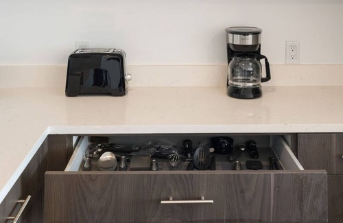 Cedars Apartment | Sleek loft style 2BR I Gym I Parking I Workspace