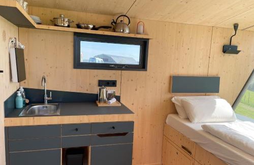 Kuhndorf House | Sleep Space 1 - Green Tiny Spot Dolmar