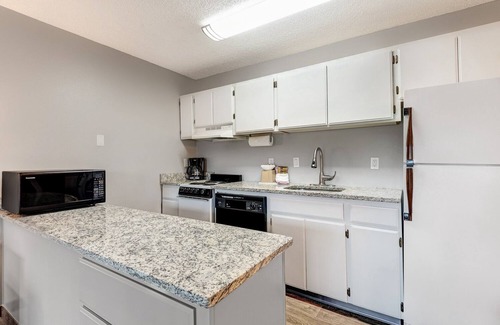 Bend Condo | "Slope Floats" Downtown Riverfront Condo. Best location in Bend!