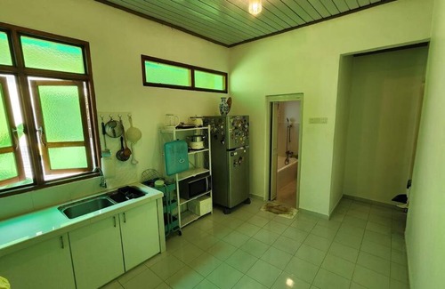 George Town House | Small Green Bungalow in Balik Pulau