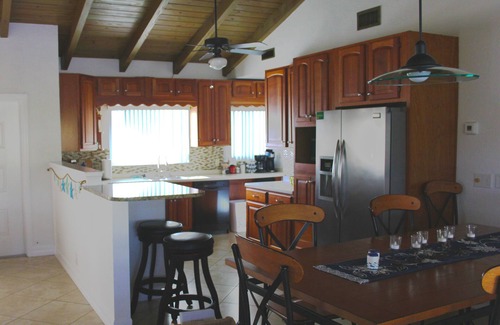 Palmetto House | Snead Is Waterfront-Solar Heated Pool, 40 ft Dock, fishing, Kayaks, Pet Friendly