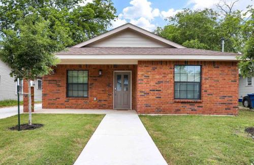 Eastside Promise Neighborhood House | Sneaker themed house near Downtown SA with 3 king beds