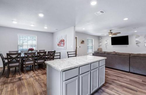 Eastside Promise Neighborhood House | Sneaker themed house near Downtown SA with 3 king beds