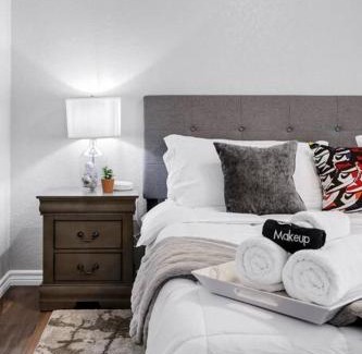 Eastside Promise Neighborhood House | Sneaker themed house near Downtown SA with 3 king beds