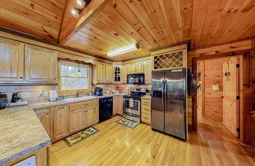 Morganton Cabin | Snowbird-Friendly Lodge w/Scenic Deck, Game Room, Hot Tub, High-Speed WiFi