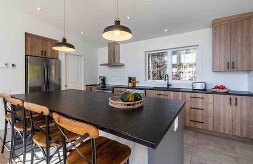 Les Eboulements Ski Chalet | Solar 79: Panoramic Views, Spa, Trails, & Privacy