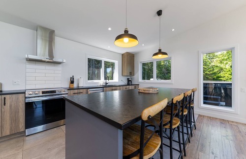 Les Eboulements Ski Chalet | Solar 79: Panoramic Views, Spa, Trails, & Privacy