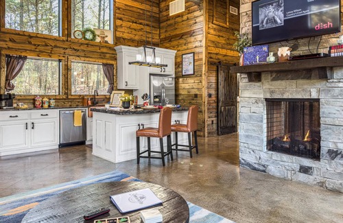 Hochatown Cabin | Somewhere With You -Features a hot tub & fire pit; accommodates 2 to 4 guests.