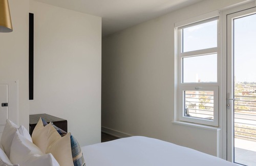 Truxton Circle Apartment | Sonder Vicino | Two-Bedroom Apartment w/ Balcony