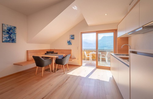 Tramin Apartment | Sonnenhof Apartment "Kalterer See" with panoramic terrace and saltwater pool