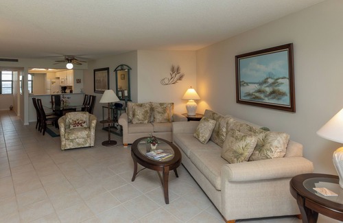 Marco Island Condo | South Seas Tower 4 #701 Looking at Sunset. Decorated with light pastel décor.