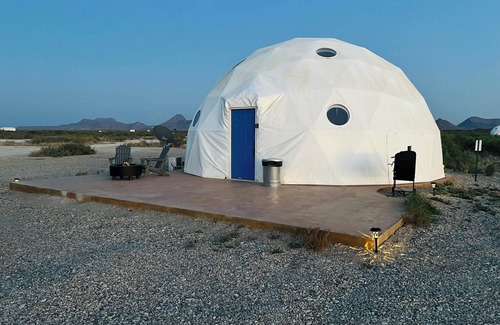 Terlingua RV Rental | Southern Boho inspired Geodesic Dome nestled up next to Big Bend National Park.