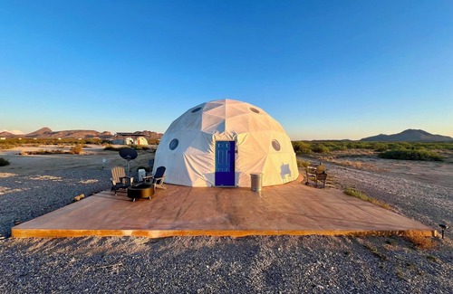Terlingua RV Rental | Southern Boho inspired Geodesic Dome nestled up next to Big Bend National Park.