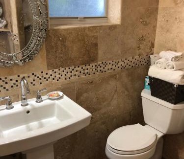Uptown - Upper Duval Bed & Breakfast | Southernmost Point Guest House & Garden Bar